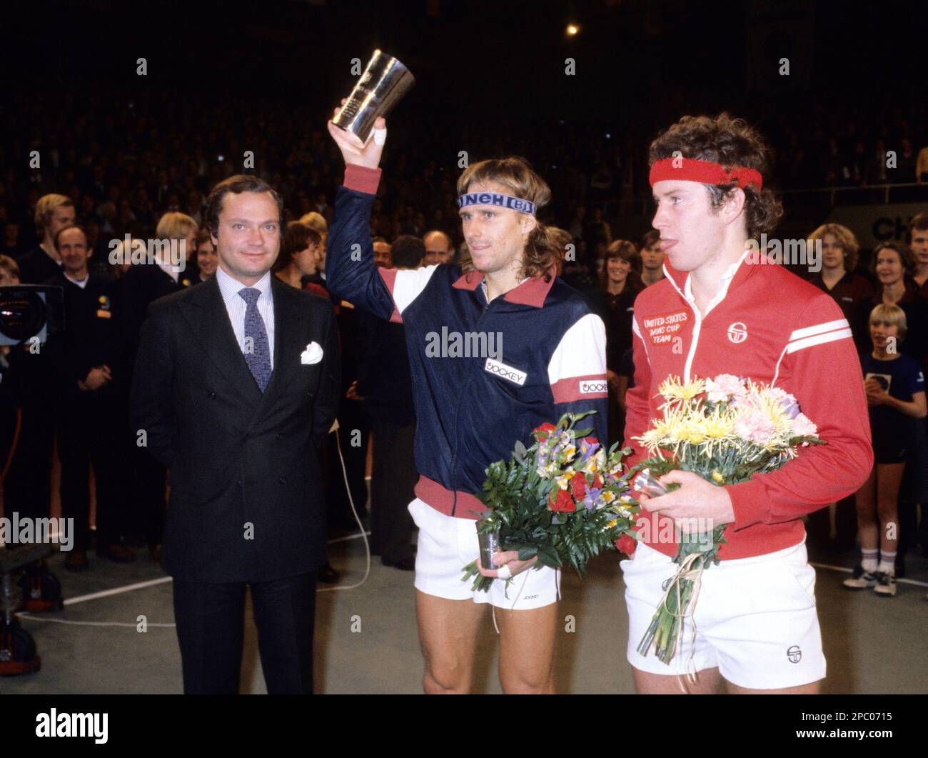Sweden`s King Carl XVI Gustaf hands out prizes to final winner Bjšrn Borg Sweden and second John McEnroe USA after the final in the Stockholm Open Stock Photo